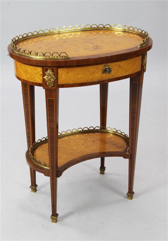 French cross banded maple and marquetry oval occasional table(-)
